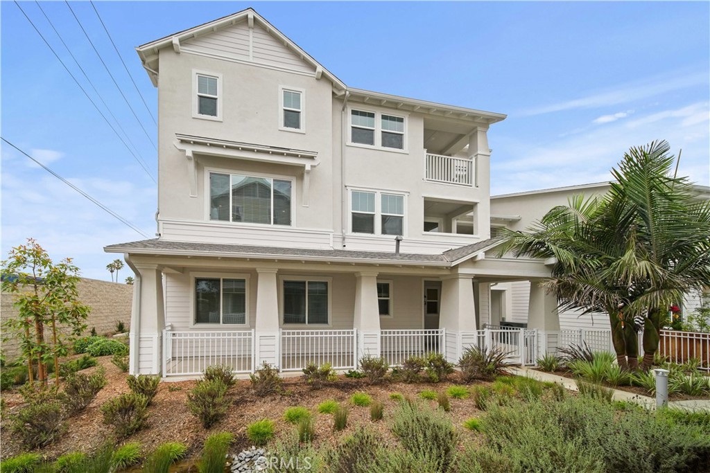 Modern Coastal Luxury Townhome Rare Multi-generational floor plan by the Ocean-NEW CONSTRUCTION-Move-in ready – last homes available! Experience the ultimate in modern coastal living in this stunning end-unit luxury townhome surrounded by lush landscaping, just moments from the ocean. This thoughtfully designed residence combines elegant finishes, open spaces, and flexible living for a multi-generational lifestyle.
Main Level:
Enter through a beautifully landscaped, large fenced front patio that welcomes you into a spacious multi-generational suite complete with a kitchenette area featuring a sink, microwave, mini fridge area, and shaker-style upper and lower cabinets. The ensuite bathroom features a vanity area and a walk-in shower with oversized white tile to the ceiling, creating a serene, spa-inspired coastal vibe. Additional highlights include a storage nook leading into ensuite and a stackable washer and dryer laundry closet in the hallway leading to the multi-generational suite, with easy garage access for convenience.
Second Level:
The open-concept gourmet kitchen is a chef’s dream, featuring Wolf appliances, a large island with bar seating, shaker cabinets, a walk-in pantry, and an open butler’s area with additional prep space and built-in microwave in the lower cabinets. Separate dining area with a private patio, perfect for extended dining, relaxation or entertaining. This level also includes a bathroom with vanity and a private bedroom with a walk-in closet, ideal for guests or a home office.
Third Level:
Upstairs, enjoy a convenient side-by-side laundry closet in the hallway. A secondary bedroom offers a walk-in closet and ensuite bathroom with a tub-shower combo accented by full-height oversized white tile and a shaker vanity with dual sink that continues the home’s coastal aesthetic.
The gorgeous primary suite is a true retreat, featuring two walk-in closets, a private balcony, and a spa-like ensuite with a freestanding soaking tub and a walk-in shower surrounded by oversized white tile to the ceiling.
Throughout the home, large windows fill every room with natural light and provide charming neighborhood views, while the lush landscaping enhances the home’s private, coastal-style.
Don’t miss this opportunity—this move-in ready, beautifully staged home is prepared for buyers today. Last homes available—schedule your private showing before it’s gone!