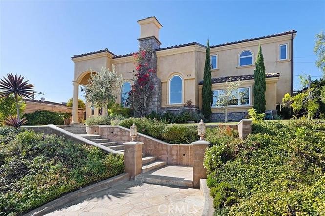 Welcome to your dream home in one of Newport Beach's most coveted neighborhoods-Newport Heights. Perfectly positioned in an ideal walk to everything location, this expansive residence offers the best coastal So Calif living, just minutes from the scenic harbor, ocean breezes, and top tier coastal amenities. Boasting 4 generously sized bedrooms, including a highly desirable downstairs bedroom for guests, multigenerational living or primary, this home offers an abundance of space & flexibility. Designed with attention to detail, the interiors showcase beautiful natural stone finishes, adding a sense of timeless luxury and refines craftsmanship throughout.While the open floor plan seamlessly to a private backyard, ideal for entertaining or enjoying the coastal breezes. The gourmet kitchen light filled living areas, and spa inspired primary suite makes this home both functional & sophisticated. Set on a quiet street and close to award winning schools & Newport's vibrant lifestyle scene, this rare opportunity.