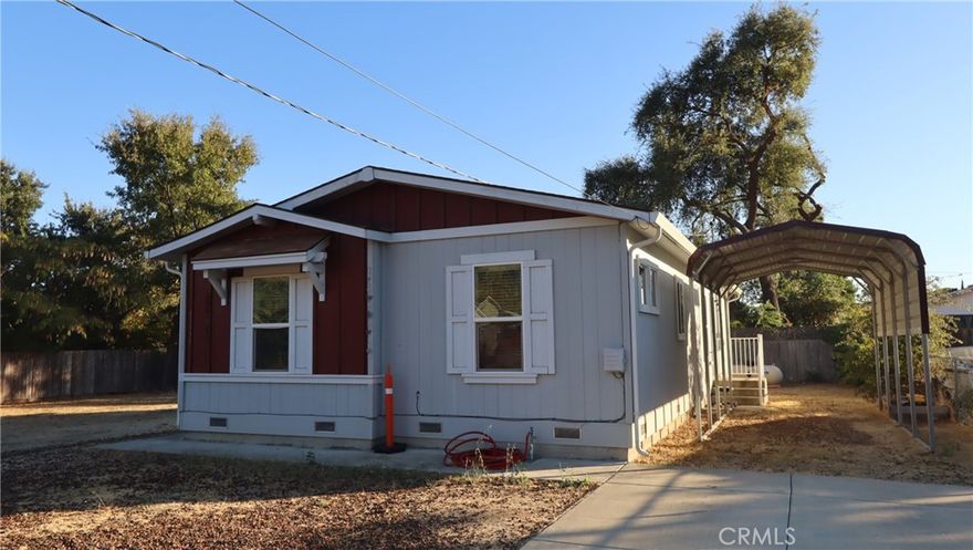 Lake Life with Modern Style! Built in 2017, this three bedroom, two bath manufactured home offers the perfect blend of comfort, quality, and outdoor adventure. Just minutes from Clear Lake and a nearby boat launch, you’ll enjoy world-class fishing, boating, water sports, and hiking right at your doorstep. Inside, the open floor plan shines with a gourmet-style kitchen featuring a large island, sleek counters, upgraded flooring, and high-end finishes that give the home a fresh, modern look. Bedrooms on opposite sides of the living area provide privacy for family or guests, while the level, partially fenced lot adds everyday convenience. And because this newer home means fewer worries about repairs, you can spend more time soaking up the lake lifestyle and less time on upkeep. Perfect for full-time living, a relaxing retreat, or an investment property, this home delivers both style and peace of mind.