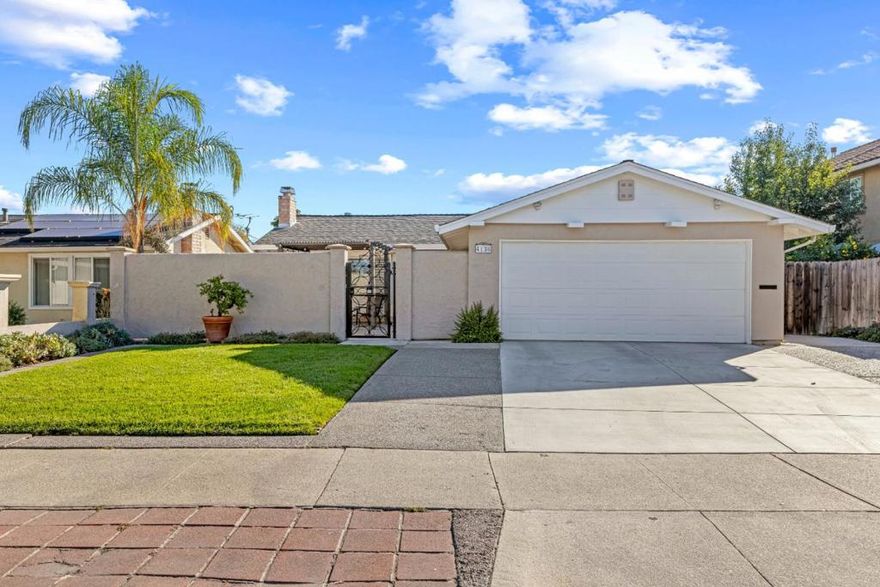 Welcome home to this beautifully updated single-story nestled on a spacious lot of over 7,500 square feet surrounded by mature fruit trees and room to roam! Avocado, apple, orange, grapevines, and a thriving garden bed bring this yard to life. Lovingly cared for by the same owners for over 35 years, this home exudes pride of ownership and thoughtful updates throughout. Step inside to a bright, open living space featuring dual-pane windows, copper plumbing, and an updated kitchen with sleek countertops, double ovens, and abundant storage for all your culinary needs. Both bathrooms have been tastefully remodeled, offering a clean and modern feel. The primary suite includes two closets and a private bath, providing a comfortable retreat at the end of the day. Additional highlights include an alarm system, a roof with over 25+ years of life remaining, and French drains for added peace of mind. Outside, enjoy your own private oasis complete with lush fruit trees, a sprawling yard, and endless potential for gardening, entertaining, or even adding an ADU. Perfectly blending indoor comfort with outdoor charm, this home sits in a desirable San Jose location close to shopping, schools, and commuter routes.  Driveway can fit 3 cars.