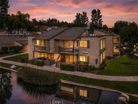 Photo of 24518 Nicklaus Drive #O10, Valencia, CA 91355 (MLS # SW26181203)