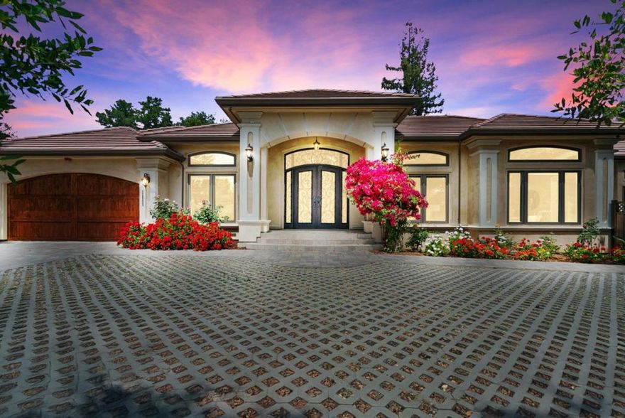 Welcome to 12805 Pierce Rd. A private Saratoga oasis. This beautifully designed 6-beds, 5-bath home offers 4,040 sqft of elegant living space on a spacious 17,076 sqft lot. Step through the grand iron double doors into a light-filled foyer with marble flooring, soaring ceilings, and a sparkling crystal chandelier. Off to the sides, a private office, a formal living room, and a dining area with a gas fireplace and wet bar are ready to be filled with laughter. Viking appliances, skylights, marble counters, and travertine floors adorn the kitchen, just waiting for you to whip up quick breakfasts and elaborate feasts. Rewind and reset within the walls of the primary suite, which includes a bay window, backyard access, and an ensuite that rivals a luxury hotel. Step outside to the peaceful gardens, stone benches, and 3 fountains as you enjoy your new home, or visit the ADU with a private entrance, kitchen, and dedicated bathroom - the perfect haven for guests! Built with comfort and efficiency in mind, this home includes two A/C systems , two tankless water heaters, fully owned solar panels, a whole-house vacuum system, and full fire safety systems. This home is close to  farmers market, SR-9, 85, shopping, parks, restaurants, entertainment, trails, Saratoga Sunnyvale Road, and more!