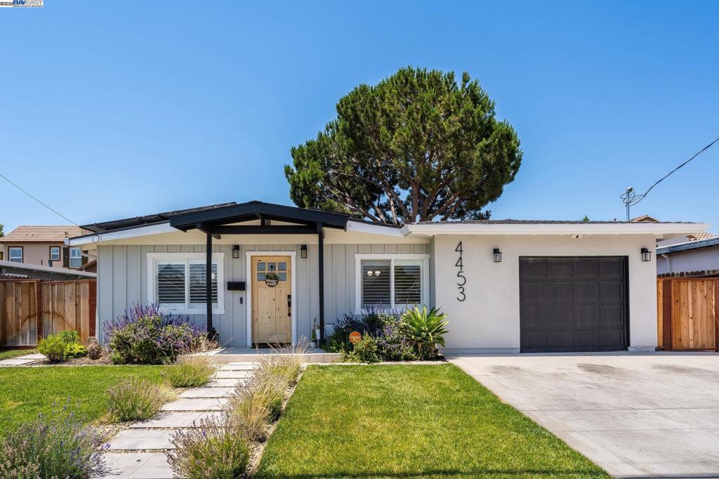 This GORGEOUS, EXPANDED, & REMODELED 3 bedroom, 2 bathroom home in the highly desirable SUNDALE neighborhood has so much to offer! Situated in the HEART of this FREMONT community, your future EAST FACING home has FANTASTIC natural lighting throughout & SO MANY BEAUTIFUL upgrades! From the GOURMET kitchen featuring QUARTZ counters, ELEGANT cabinets, brand new HIGH-END stainless steel appliances, & a LARGE farmhouse sink, to the ELEGANT laminate flooring throughout, to the SPACIOUS eat in area overlooking the patio; who can ask for anything more? The GRAND primary room with a RESORT STYLE bathroom featuring an OVERSIZED shower stall, dual vanities, & EXTRA-LARGE closet is a DREAM come true! And, having 2 additional rooms & COMMODIOUS bathroom makes this home PERFECT for a growing family or one that loves to host and have company! The backyard serves as your PRIVATE OASIS complete with a PLUSH patio, low maintenance turf floors, & a RESORT STYLE bar with BBQ that is PERFECT for RELAXING & ENTERTAINING! Complete with modern solar panels, two TESLA power walls, built in TESLA charging station, & NEST thermostat, being close to the AWARD winning schools, shopping, restaurants, trails, parks, and ALL OF SILICON VALLEY; this CROWN JEWEL of the neighborhood is a 100% MUST SEE!!!