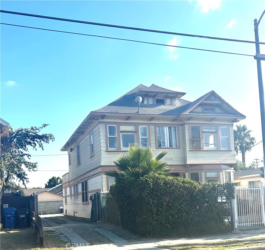 STANDARD SALE - A Turn-of-the-Century Triplex in South LA — Ready for Its Next Chapter...Built in **1904**, this split-level triplex offers a rare opportunity to own a piece of Los Angeles history. Featuring one spacious **2-bedroom/1-bath** unit upstairs and two **1-bedroom/1-bath** units downstairs, each with its own gas meter, the property blends vintage character with untapped potential. Come with your hammer, nails & creativity, ideal for an all-cash buyer or those using an FHA 203(k) renovation loan. Underneath, the structure benefits from **concrete supports**. Practical updates include **low-flow fixtures**, electrical panels have been updated, a properly strapped water heater, and a roof bump-out that could bring true charm & add unique curb appeal. A **partial basement**, accessible from unit 150, offers additional storage or creative use. Situated near major freeways, the property is just minutes from **Exposition Park**, the **Los Angeles Memorial Coliseum**, **Banc of California Stadium**, and the **California Science Center**. Downtown LA with tons of eateries and high energy happenings, USC, and the Arts District are also within easy reach. **The property is being sold, "AS-IS", Located within the jurisdiction of Los Angeles rent stabilization (RSO) guidelines.
This property stands as a **quiet nod to LA’s history, ready for its next chapter**—a perfect canvas for the right buyer to restore and reimagine.