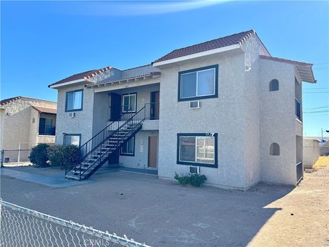 Photo of 624 E Virginia Way, Barstow, CA 92311 (MLS # CV25243545)