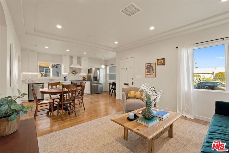 Welcome to this stunning, brand-new remodel in the heart of Rancho Park one of West LA's most desirable and convenient neighborhoods. Buyers will love the peace of mind that comes with major system upgrades throughout, including: new roof, new electrical panels, new electrical wiring throughout the home, new sewer line under the house, new copper plumbing under the house, new tankless water heater, new HVAC system, new windows, and more. Located within the highly regarded Clover Avenue Elementary School district, this 3 bedroom, 2 bathroom home offers modern comfort, thoughtful upgrades, and a lifestyle that's hard to beat. Step inside to discover a light-filled floor plan and a private family room featuring a wood-burning fireplace, perfect for cozy evenings at home. Rancho Park offers a warm, welcoming community with unbeatable access to the best of Los Angeles. Enjoy easy freeway access, the Expo Line station just up the street, vibrant Sawtelle Japantown restaurants, multiple grocery stores within blocks, and you're just 15 minutes from the beach. This is truly a rare opportunity to own a turnkey home in a prime Westside location. Start the new year in your new home! *Front yard has been seeded with grass*