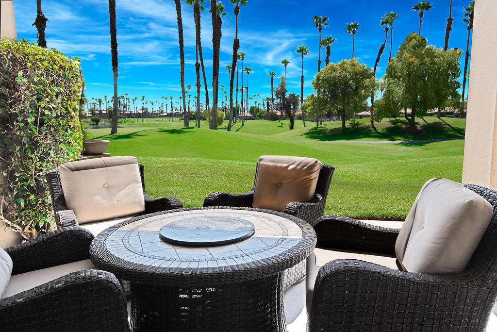 Is it possible to be too gorgeous? Once you walk into this elegantly remodeled condo on the Palm Valley Country Club Challenge Course, you will think you have stepped into a luxury 5-star hotel. A 2 Bedroom, 2 Bath open concept design, it is made for entertaining in style. After a round of golf, , bring your friends to your home. Open up the wine refrigerator and bar. Enjoy your refreshments on the back patio overlooking the greenery of the golf course. Start the barbecue in the enclosed courtyard. On a cool evening, start up the firepit and enjoy the moonlit skies, or stay cozy inside with the living room fireplace and extra large-screen TV. The pool is just steps away for your morning swim. Palm Valley Country Club has 2 beautiful golf courses, 12 tennis courts and 12 pickleball courts. The 100,000 SF Clubhouse is one of the largest in the country,with a large dining room, grill and bar, Fitness Center with machines, free weights, a Spa, and more. A casual cafe serves beakfast and lunch. PVCC has a very active social calendar including entertainment and dancing in the Sunset Grill. For a little tidbit: This condo was owned by a Hollywood Glam Girl who was involved with Mickey Rooney for a time. She loved the location because she could zip in and out of the back gate. Move in and plan to have a good time! Just bring your toothbrush!