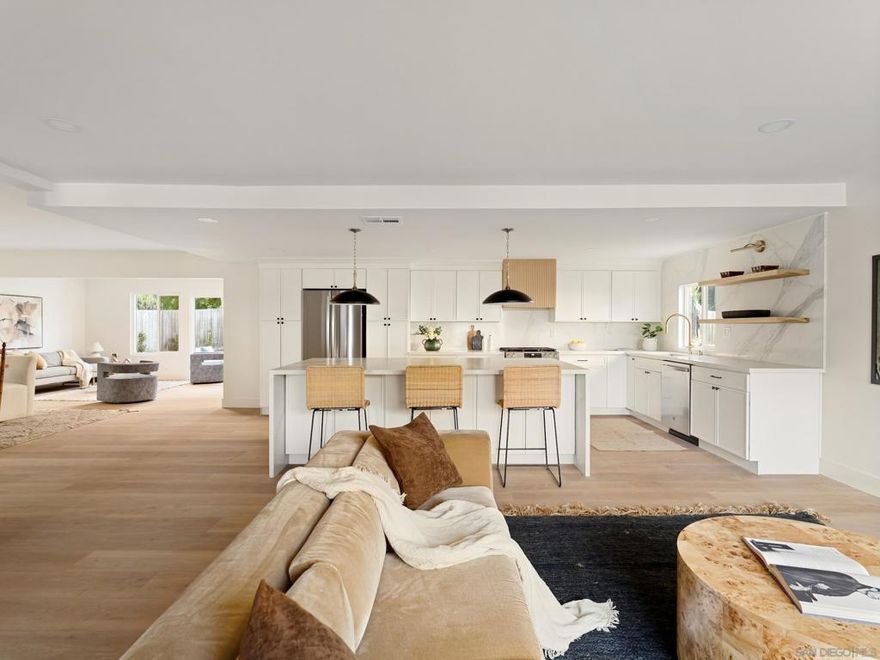 Welcome to this stunning, fully renovated home that blends modern upgrades with timeless design on a large, useable cul-de-sac lot. Inside you’ll find an open floor plan with new LVP flooring, fresh paint/texture, all new dual pane windows, and a beautifully redesigned fireplace. The chef’s kitchen features slim white shaker cabinetry, a white oak waterfall island, quartz counters, stainless steel appliances, and a microwave drawer. The primary suite offers a spa-like bath with dual vanity and tiled walk-in shower. Includes a permitted private-entry multigenerational ADU suite with kitchenette, bath, AC—perfect for guests, extended family, or rental income. Exterior upgrades include all new landscaping with sod, planters, mulch, automatic sprinklers/drip system, garage door, and full exterior paint. Newer roof with warranty,  paid-in-full solar, and two Tesla Back up Batteries. Full sized indoor laundry room with storage, mirrored closet doors, recessed lighting and new GFCI’s throughout. This home has been fully reimagined for modern living and is 100% move-in ready.  Welcome to this stunning, fully renovated home that blends modern upgrades with timeless design on a large, useable cul-de-sac lot. Inside you’ll find an open floor plan with new LVP flooring, fresh paint/texture, all new dual pane windows, and a beautifully redesigned fireplace. The chef’s kitchen features slim white shaker cabinetry, a white oak waterfall island, quartz counters, stainless steel appliances, and a microwave drawer. The primary suite offers a spa-like bath with dual vanity and tiled walk-in shower. Includes a permitted private-entry multigenerational ADU suite with kitchenette, bath, AC—perfect for guests, extended family, or rental income. Exterior upgrades include all new landscaping with sod, planters, mulch, automatic sprinklers/drip system, garage door, and full exterior paint. Newer roof with warranty,  paid-in-full solar, and two Tesla Back up Batteries. Full sized indoor laundry room with storage, mirrored closet doors, recessed lighting and new GFCI’s throughout. This home has been fully reimagined for modern living and is 100% move-in ready.