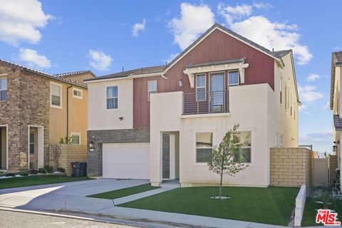 Photo of 21230 W Wildflower Way, Chatsworth, CA 91311 (MLS # 26649843)