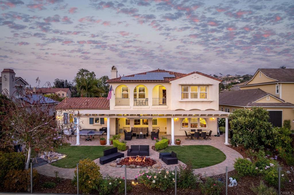 REMARKABLE, RARE OPPORTUNITY TO LEASE OR BUY! Property offered fully furnished, partially furnished, or unfurnished. Gorgeous state-of-the-art putting green just added in back yard! Overlooking the 9th hole of the renowned La Costa Golf Course in the sought after La Costa Greens community, this luxurious, highly upgraded single-family residence is an entertainer’s dream! Tucked away on a quiet double cul-de-sac street, virtually every room in this 5 bedroom, 4.5 bathroom, 4,164 SqFt house has upgraded crown molding, baseboards, and in-ceiling lighting. This home features the highest quality materials and finishes, including American black walnut hardwood and travertine flooring, plush Fabrica carpeting, custom fans and light fixtures, and solar paneling. The gourmet kitchen contains top of the line Thermador stainless steel appliances, granite countertops, a butler’s pantry that connects to the formal dining room, a walk-in pantry, and is adjoining to an expansive family room with stone fireplace. Enjoy panoramic views of the golf course and Carlsbad Hills from the master suite, which contains dual sinks and vanities with Italian marble counters, travertine flooring and shower, a sizable jetted bathtub, and an oversized walk-in closet. Ample storage and work areas throughout incorporate 3 built in desk areas, a library nook with built-in shelving, a full-sized laundry/ utility room, and a 4 car garage with built-in storage. Several outdoor entertaining areas include an enclosed front patio with a fireplace and porcelain stone, and a back yard with a beautiful gas fire pit, covered patio, lush landscaping, running waterfall, and a raised-bed garden. Residents of La Costa Greens have the exclusive use of "The Presidio" and its resort-like amenities, including a Junior Olympic size pool, tennis courts, tot lot, fitness center, and recreation room. Convenient to shopping, entertainment, dining, freeway access, multiple world-renowned golf courses and resorts, amusement parks, McClellan-Palomar Airport and an easy drive or bike to North County's best beaches! This fine home includes a wide range of upgrades and additional security features to protect you and your family.
