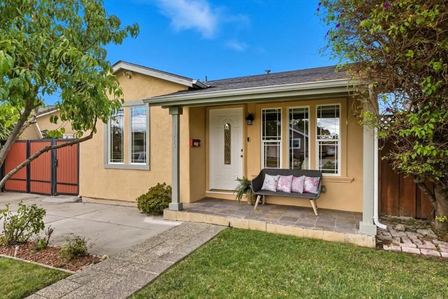 Nestled in the heart of Little Portugal in San Jose, this spacious home seamlessly combines timeless design with updated finishes throughout. Inside, natural light illuminates gleaming hardwood floors that extend across the open living space and to the airy kitchen featuring contemporary finishes, stainless steel appliances, and a large breakfast bar. The same sophisticated design graces the bedrooms: 2BR/1BA are situated near the entry of the home, while a hallway past the kitchen leads you to 1BR/1BA, as well as the primary suite that incorporates an ensuite. Relish peaceful mornings in the private backyard, complete with a paver-lined patio and a large lawn adorned with mature fruit trees. Newly converted bonus spaces provide versatility for extra storage, a home office, or a craft room. Centrally located amidst San Jose's amenities, enjoy access to Downtown, endless shopping, and delicious eateries. Local schools are nearby, as well as Highway 101 for easy travel across the bay.