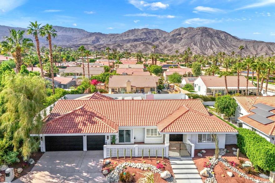 Welcome to this stunning completely move in ready 3-bedroom, 3.5-bath entertainer's paradise located in the highly sought-after no HOA South Palm Desert neighborhood.Thoughtfully remodeled with attention to every detail, this home boasts an open floor plan perfect for both relaxation and entertaining, and it comes equipped with solar panels, offering energy efficiency and reduced utility costs.The chef's dream kitchen is the centerpiece of the home, featuring custom cabinetry, brand new stainless steel appliances with bronze finishes, a large 6-burner stove, electric convection oven, double island with bar seating, and a custom microwave drawer. With three ovens in total, this kitchen is fully equipped for any culinary adventure. Direct access to the private, gated front courtyard makes indoor-outdoor entertaining seamless.The home boasts two spacious suites - a luxurious master and a junior suite along with a third bedroom- each featuring its own en suite bathroom with custom vanities and beautifully redone showers.  The living room flows effortlessly into the large family room featuring a bar and powder room, creating ample space for all gatherings.Step outside to your desert oasis, where the backyard offers a serene space complete with desert landscaping, a putting green, covered patio, and plenty of room for lounging by the pool.Located just minutes from highly rated Washington Charter School, El Paseo shopping, Westfield Mall, Whole Foods, and more, this home truly has it all!