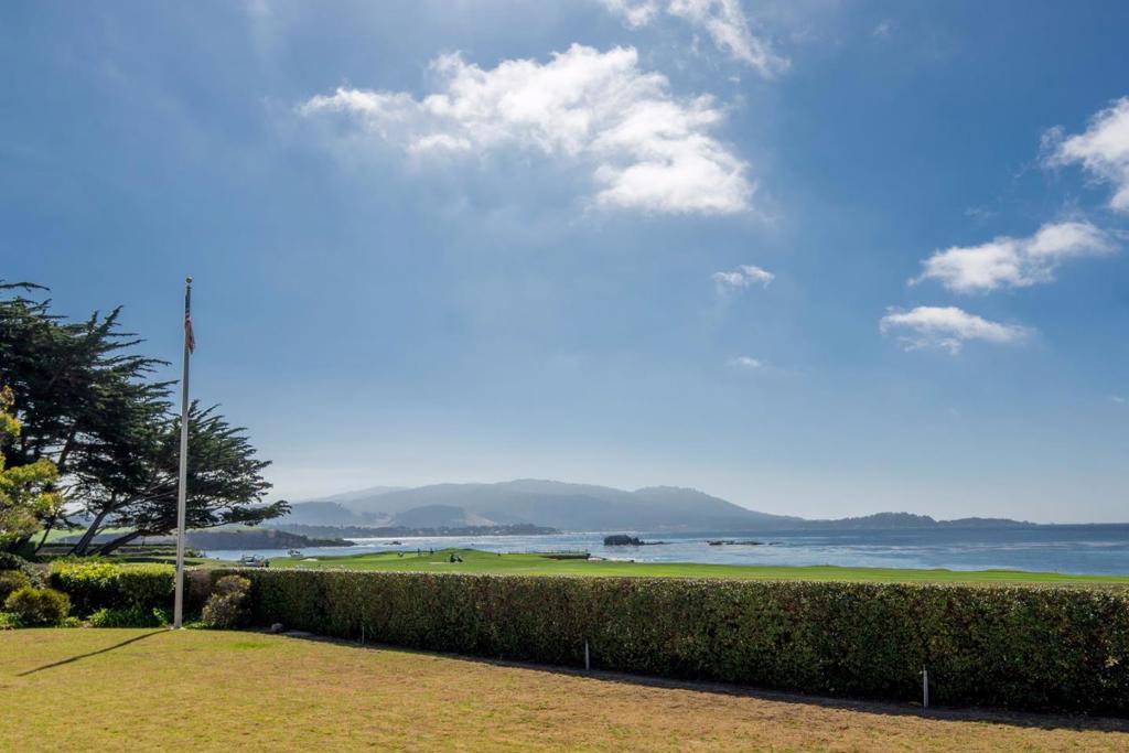 One of only 5 properties located along Pebble Beach's famed 18th hole, this extraordinary location truly presents a historic opportunity. Offering stunning views of the Links and Carmel Bay and a short stroll to The Beach Club, Casa Palmero and The Lodge, this gracious 4 bedroom home, the first non- Mediterranean home to be approved by SFB Morse, awaits its next fortunate owner. Genuinely a unique property and opportunity.