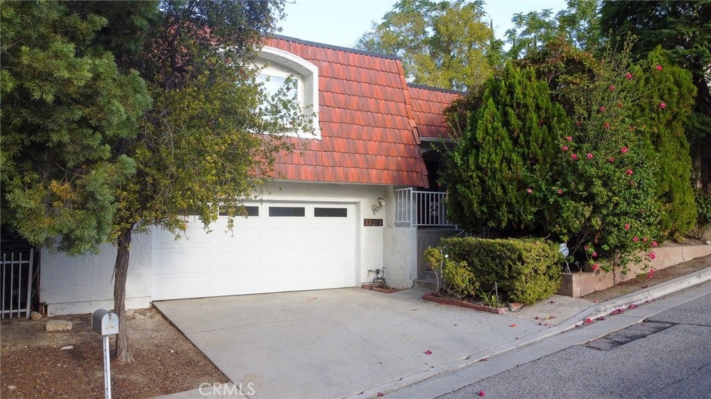 Photo of 22762 Avenue San Luis, Woodland Hills, CA 91364 (MLS # GD26214795)