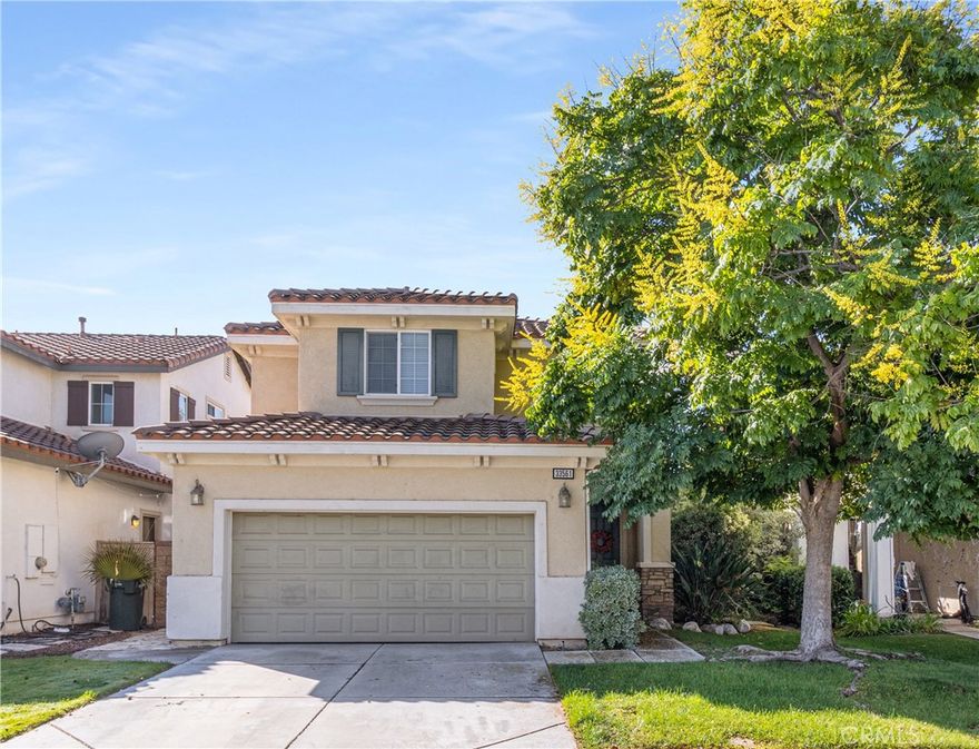 Step into this beautifully maintained 3-bedroom, 2.5-bath home in the sought-after Canyon Lake community. With gleaming hardwood floors throughout and elegant crown molding, every corner radiates charm and comfort. The open concept living area features recessed lighting with dimmers and a cozy fireplace, perfect for relaxing or entertaining. The gourmet kitchen boasts granite countertops, espresso cabinets, stainless-steel appliances, and an oversized breakfast island that flows seamlessly into the living space.  Upstairs, enjoy a versatile loft (easily convertible to a 4th bedroom), a convenient laundry room, and spacious bedrooms. The luxurious primary suite includes a private balcony overlooking the backyard, a spa-like bathroom with a soaking tub, and a walk-in closet.  Outside, the low-maintenance backyard is an entertainer’s paradise with a paved hardscape and built-in BBQ island. Enjoy central air and heat, a two-car garage, and proximity to scenic hiking trails, parks, and mountain views.  Located near Canyon Lake with access to a Country Club and golf course.