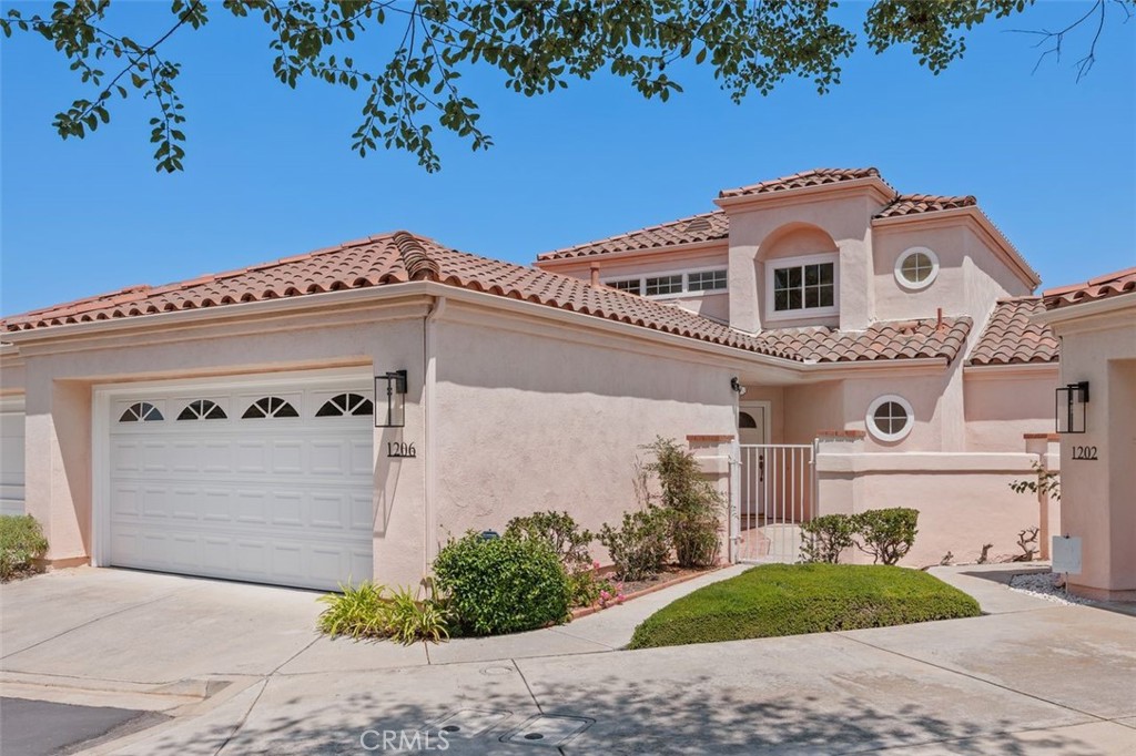 This AMAZING LAKE VIEW TOWNHOME in The Colony at Lake San Marcos offers 1,360 sq ft of well-designed living space with BREATHTAKING VIEWS!!! Featuring two PRIMARY SUITES—one upstairs and one downstairs—each with its own ensuite bathroom, plus a spacious LOFT perfect for a home office, playroom, or flex space. Enter through a gated courtyard into a bright living room with soaring ceilings and a cozy gas fireplace. The kitchen offers ample cabinetry, a charming breakfast nook, and a conveniently located indoor laundry room. Nearly every room enjoys stunning views and access to a welcoming patio—ideal for relaxing or entertaining family & friends. Located near the St. Mark Executive Golf Course and the newly opened Amalfi wine bar, Enoteca. The HOA covers structure, roof, insurance, pest control, exterior maintenance, 24-hour security patrol, Lake San Marcos amenities, and clubhouse access across the street. The home could use a bit of TLC—bring your imagination and make it your DREAM HOME! LOCATION, LOCATION, LOCATION!! Be QUICK to SEE!!!