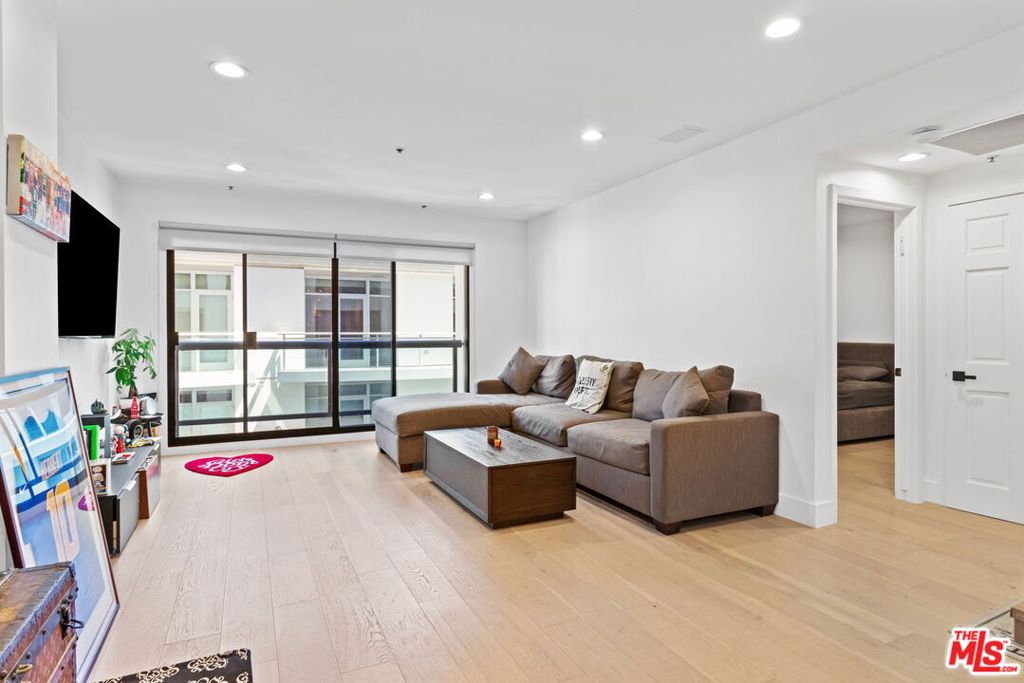 Welcome to this meticulously remodeled condo in the Iconic Park Wilshire Building. Seamlessly blending modern luxury with the vibrant energy of city living. Nestled in the heart of Los Angeles, this condo is perfectly situated for those seeking the ultimate city experience. Expansive Chef's kitchen is complimented nearby with a large laundry room and guest powder bathroom. Open floor plan allows seamless transition into the generous living area with access to the outdoors through a size-able sliding glass door. Capped off with a substantial primary room and fully remodeled ensuite with top end luxury finishes. This luxury building is equipped with a 24/7 doorman, controlled security access, substantial pool/spa area, newly upgraded exercise room and several conference and banquet rooms.