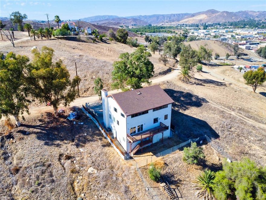 Renovated & Upgraded — Now 7 Bedrooms and 4 Bathrooms!  Easy showing, just make a call to get access code.



Don’t miss this rare opportunity to own a beautifully remodeled hilltop home in the historic Country Club Heights of Lake Elsinore. Featuring over 3,360 sq. ft. of living space with unparalleled panoramic lake and city views, this home perfectly blends classic charm with modern luxury.



Enjoy two spectacular view decks — a 1st-floor open panoramic balcony offering sweeping vistas of the entire city and lake, and a 2nd-floor enclosed panoramic balcony that lets you take in the scenery year-round, rain or shine. Truly one of a kind!



The open floor plan includes a stylish upgraded kitchen, a spacious family room, and a separate downstairs 2-bedroom, 1-bath suite with its own private entry, ideal for multi-generational living or rental income.



Price includes two parcels — APN 375-321-058 (built now) and APN 375-321-059 (for future development), providing exceptional expansion and investment potential. Nestled on a peaceful hill yet minutes from shopping, dining, and freeway access, this property offers the perfect balance of privacy, space, and convenience.



Very motivated seller — don’t miss this extraordinary opportunity!