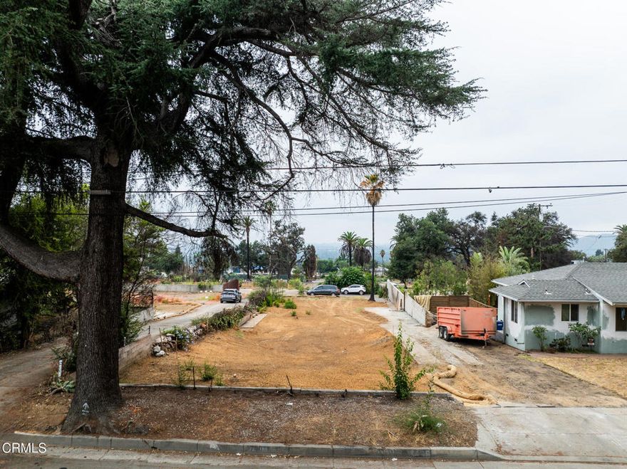This lot is ideal for future development assessor map shows  50 x 209 nice deep 10,499 foot rectangular lot. located just west of Lake Ave.A savvy contractor after walking the site will notice development possibilities the gentle down slope at street frontage may offer tuck under garages, saving additional lot space to build more structures on. In addition utilizing setbacks may offer a wider house build. County records show what may have been a guest house ?Buyer to verify how many structures may be built on subject property under current code. From street level their are city light & mountain views. Great lot north of Altadena Dr.See attached plot maps adjacent to the blue easement line is aprox 15 foot paved road surface entry off Poppyfields this connects to a 30 ft easement at the south portion of subject property may allow Ingress & Egress separate entry to guest house /ADU at rear of deep lot. Buyer to verify.