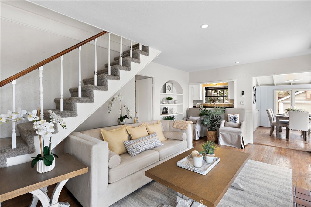Historic 1929 Victorian-Style Cottage with Ocean Views & ADU Potential in North Laguna Beach. Nestled just 0.2 miles from Crescent Bay Beach and Shaw’s Cove, and under a mile from Main Beach, this two-story Victorian gem built in 1929 offers a rare coastal blend of charm and modern livability. Step back in time and experience the enduring romance of this Victorian-era jewel, perched just moments above Laguna’s legendary Crescent Bay. With its gabled rooflines, classic detailing, and rich architectural heritage, this cherished residence stands as a rare testament to Laguna Beach’s early coastal charm—lovingly preserved and thoughtfully updated for modern living. Originally built when craftsmanship reigned supreme, this two-story, ocean-view home offers three bedrooms and two baths across a warm, inviting layout that honors its past. Original hardwood floors, a character-rich fireplace, and period woodwork reflect the grace of a bygone era. 2 bedrooms upstairs plus an office/den with ocean views offer flexible living space, and a main-level bedroom and bath complete the layout. The kitchen appointed with granite countertops and open to the dining area balances old world character with present-day functionality. Recent upgrades include a newer split-system HVAC serving both levels, fresh interior paint and a new driveway that blends seamlessly with the home’s historical charm. Outdoors, a generous, flat backyard provides a rare expanse of usable space in this coveted neighborhood—ideal for garden parties or future expansion. Above, a spacious deck reveals panoramic views of the Pacific, echoing the serenity and beauty that has drawn generations to Laguna’s shoreline. Zoned R2 and brimming with potential, the property invites possibilities rarely found in homes of this caliber. With the addition of an ADU, the home could legally comprise up to three distinct units, making it ideal for extended family, guest quarters, or income-producing use. The detached two-car garage is perfect for conversion to a charming guest cottage, creative studio, or in-law suite. The Laguna Beach Trolley stop just one block away offers effortless access to the galleries, cafes, and cultural institutions.
Rarely does a home of such historical distinction and coastal proximity become available. Whether you’re a preservationist, a romantic, or simply someone who values authenticity, this is a timeless sanctuary waiting to be cherished for generations to come.