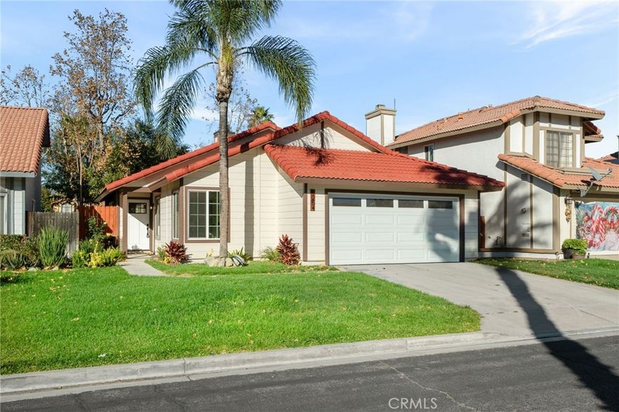 Welcome to your dream home at 1254 W Van Koevering St — a beautifully renovated, move-in ready single-story residence in a serene cul-de-sac, nestled in the heart of Rialto. Step inside to discover an open-concept floor plan under soaring vaulted ceilings — perfect for modern living and entertaining. The home boasts 3 bedrooms and 2 full baths across 1,352 square feet of refined living space. Every detail has been refreshed, including a brand-new roof, updated plumbing and electrical with a new panel, energy-efficient dual-pane windows and doors, LED recessed lighting, and fresh interior and exterior paint. New drywall, insulation, vinyl flooring, and modern fixtures contribute to the turnkey condition. The open chef’s kitchen is a showstopper — complete with a large island, quartz countertops, soft-close cabinets, and new stainless steel appliances. Whether you’re hosting dinner or enjoying a casual breakfast, this kitchen offers both style and practicality. Enjoy cozy evenings by the fireplace in the spacious family room, or step outside to a fenced backyard — a private retreat ideal for relaxation and afternoon barbecues. The front yard is professionally maintained by the community, giving you instant curb appeal without the maintenance hassle. Parking and storage are handled with ease thanks to the attached finished 2-car garage with direct access and extra driveway space. Beyond the home itself, you’ll love the community amenities: take a dip in the sparkling pool, unwind in the jacuzzi, or enjoy leisurely strolls along well-kept greenbelts. The neighborhood offers 24-hour patrol security for added peace of mind. This location also gives you convenient access to major freeways, local schools, shopping centers and everyday essentials — combining suburban comfort with connectivity. If you’re seeking a turnkey, contemporary home that blends modern updates with community living near Rialto conveniences — this is it. Schedule your showing today and imagine the possibilities.