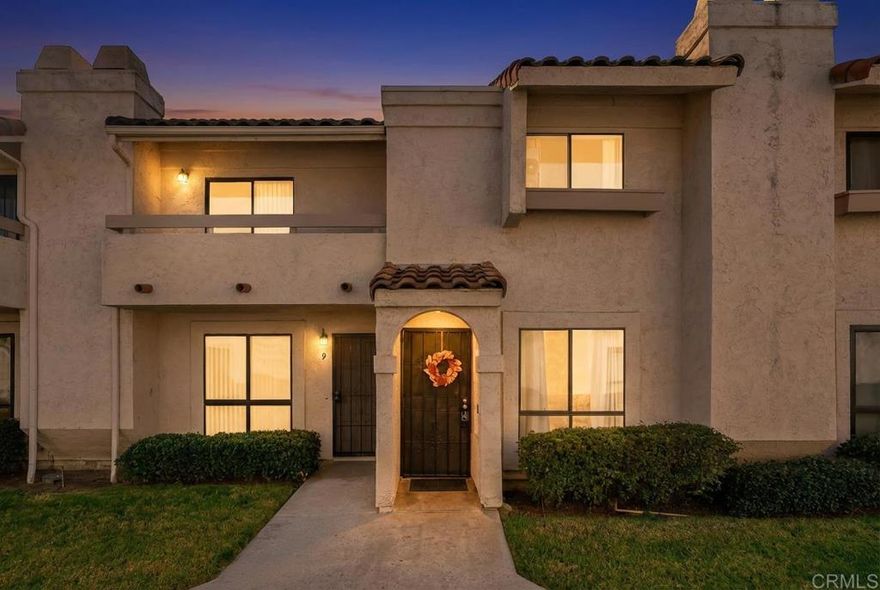 This updated townhome delivers comfort, function, and a clean modern style throughout. The living room welcomes you with a warm, inviting feel the moment you step inside. The kitchen has quartz countertops, shaker cabinets, and stainless steel appliances that make everyday cooking feel effortless. An updated patio slider opens to your private outdoor space, while in-unit laundry brings extra convenience. Both bedrooms offer comfortable proportions, and the layout makes great use of every square foot. This unit includes two parking spaces—one uncovered and one in a carport—with convenient bonus storage. The community adds even more value with a pool, spa, and a basketball court, along with water and trash service included in the HOA fee. It all comes together to create a space that feels easy to maintain, comfortable to live in, and truly welcoming from the moment you arrive.