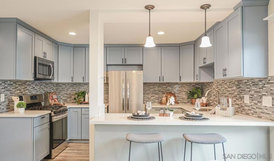 Welcome home to this beautifully remodeled two bedroom, two and one half bathroom townhome, dedicated laundry room w/ brand new full size new washer & dryer & garage, in sought-after UTC.  With elegant updates, an open floor plan with an inviting atmosphere, this home offers both comfort and sophistication. Spacious master suite with volume ceilings, two closets and master bath with designer touches, large vanity, dual sinks with free standing linen closet. Fresh paint throughout and generous secondary ensuite bedroom with lovely patio space to relax and take the day off. Step outside to enjoy world-class shopping, trendy restaurants, and vibrant community spaces — all just moments away. The perfect combination of style, location, and lifestyle. Complex features a pool, spa, tennis & pickleball courts.