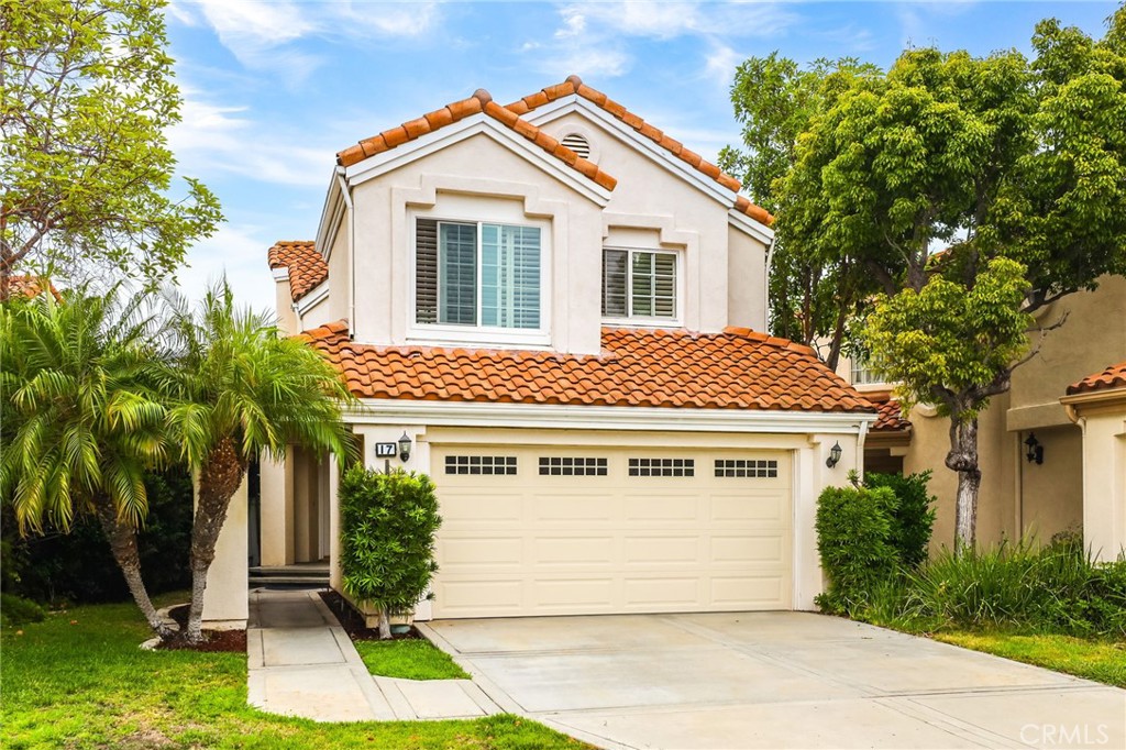 Located in the Prestigious Irvine Community of Westpark, Designed to Embrace California’s Indoor Outdoor Living, Sophistication and Elegance are the Hallmarks of this Impeccably Designed 3 Bedroom 2.5 Bathroom Home. Featuring Stunning Upgrades in every direction, this beautiful home has everything you have been looking for and more! The Elegant Curb Appeal and Lush Landscaping does not go unnoticed as you grace the Stone Walkway leading you to the front door. Upon entry the Elegant Upgrades are immediately noticed with Light Neutral Toned Porcelain Tile Flooring, Designer Light Fixture, and Soaring Two-Story Cathedral Ceilings allowing for an abundance of Natural Light to flood the home. The Spacious Great Room and Designated Dining Area providing the Perfect Ambiance for your daily routine. The Chef's Kitchen features Upgraded Stainless Steel Appliances, Granite Countertops, On Trend Black Hardware, Beautiful Upgraded Extended White Cabinets and a Charming Breakfast Nook. Enjoy the adjacent Family room with an Inviting Fireplace and plenty of space to entertain. Continue outside through the French Doors and relax in your Backyard Oasis with Lush Landscaping, Built In Hot Tub, ideal for Tranquility and Privacy with no direct rear neighbors. The Downstairs Laundry Nook and half bath round out the first floor. Continue upstairs and notice the Upgraded Stair Banister with Elegant Detailing. Three Spacious Bedrooms, Two On Trend Renovated Bathrooms, and a Spacious Linen Closet welcome you the Second Floor. Start your new wellness routine in the Opulent Primary Suite Retreat with High Ceilings, Designer Ceiling Fan, Walk-In Closet w Closet Organizers, Renovated Spa Like Primary Bathroom with Modern Designer Tile Detailing, Dual Vanities, and Restorative Glass Walk-In Shower. Enjoy the benefits of a Spacious 2 Car Garage and Spacious Driveway. The Resort Style Westpark Community includes pools, spas, playgrounds, tennis courts, picnic areas and so much more! Centrally located near Irvine's Award Winning Schools: Westpark Elementary, Woodbridge High, & UCI. Centrally located near Shopping, Coastal Beaches, & Business Centers! Incredible Home! COME SEE IT QUICK!