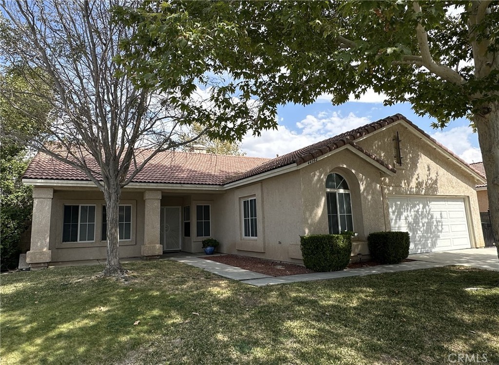 Discover the perfect blend of comfort and style in this charming 2,211 square foot single-story home located in the desirable West
Lancaster area. This residence boasts four spacious bedrooms and two well-appointed bathrooms, providing ample space for all your needs. The open
floor plan features a welcoming living area that flows seamlessly into the kitchen and dining spaces, making it ideal for entertaining or enjoying quiet
evenings at home. The kitchen is equipped with modern stainless-steel appliances, including a refrigerator, range, dishwasher, and microwave, ensuring that culinary endeavors are both enjoyable and efficient. The cozy fireplace in the open-family room adds a touch of warmth and ambiance, perfect for relaxing after a long day. With central air conditioning, comfort is guaranteed year-round, making this home a haven in any season. Step outside to the fully landscaped backyard, where a covered patio invites you to unwind and enjoy the outdoors. This outdoor space is perfect for gatherings or simply soaking in the tranquility of your surroundings. Additional features include a convenient garage and an in-home washer and dryer for added convenience. Don't miss the opportunity to make this delightful property your own!