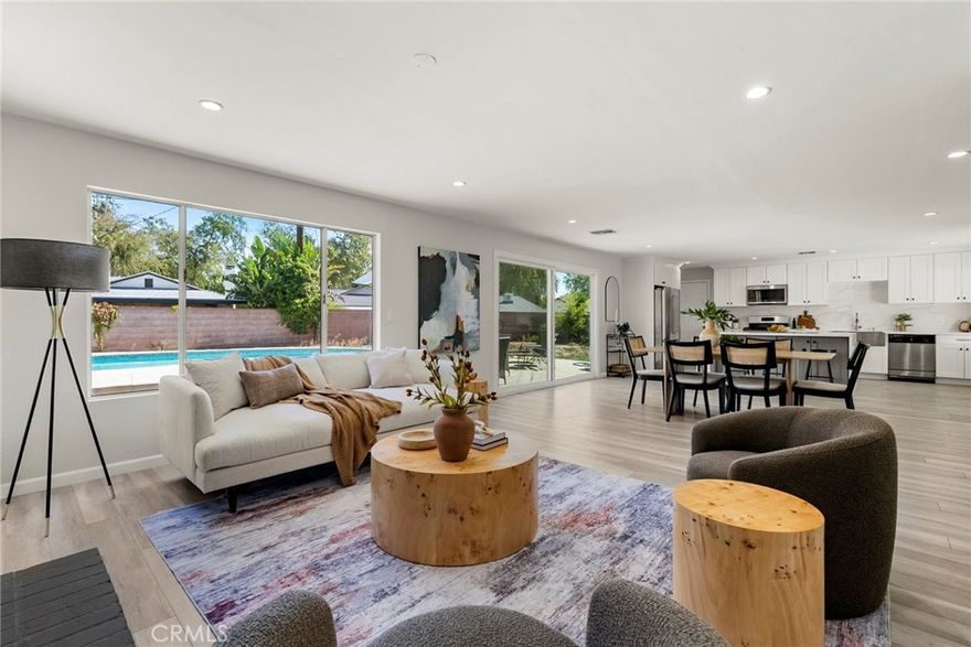 Come see this beautiful remodeled home in the desired area of West Hills! 3 beds and 2 baths, just under 1,400 sqft of living space on a nearly 8,000 sqft private lot. Perfect open layout filled with natural light. The Chef's kitchen with a center island showcases luxury living with the finest finishes and opens to the family room. The private backyard with a large grassy area is perfect for entertaining, while the sparkling large pool and lush landscape make it feel like a resort. Two attached car garage , epoxy floors and AC unit. Garage can be easily concerted to an ADU with a separate entrance and his own backyard for additional income. Located on a quiet and beautiful street. This one won't last!