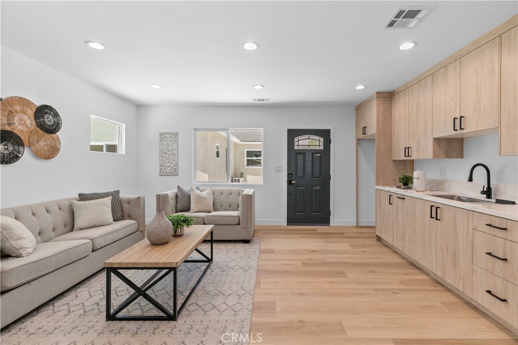 This brand new 1-bedroom, 1-bath ADU offers 515 square feet of modern living space. The unit includes laundry hookups, a functional layout, and a private backyard—perfect for tenants, guests, or extended family. Thoughtfully designed and privately situated, it provides comfort and convenience in a compact footprint.