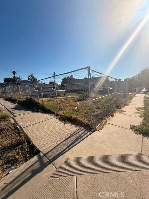 Photo of 8501 Towne AVE, Los Angeles, CA 90003 (MLS # DW26166765)