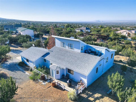 Photo of 9638 Ponderosa Road, Pinon Hills, CA 92372 (MLS # DW26202027)