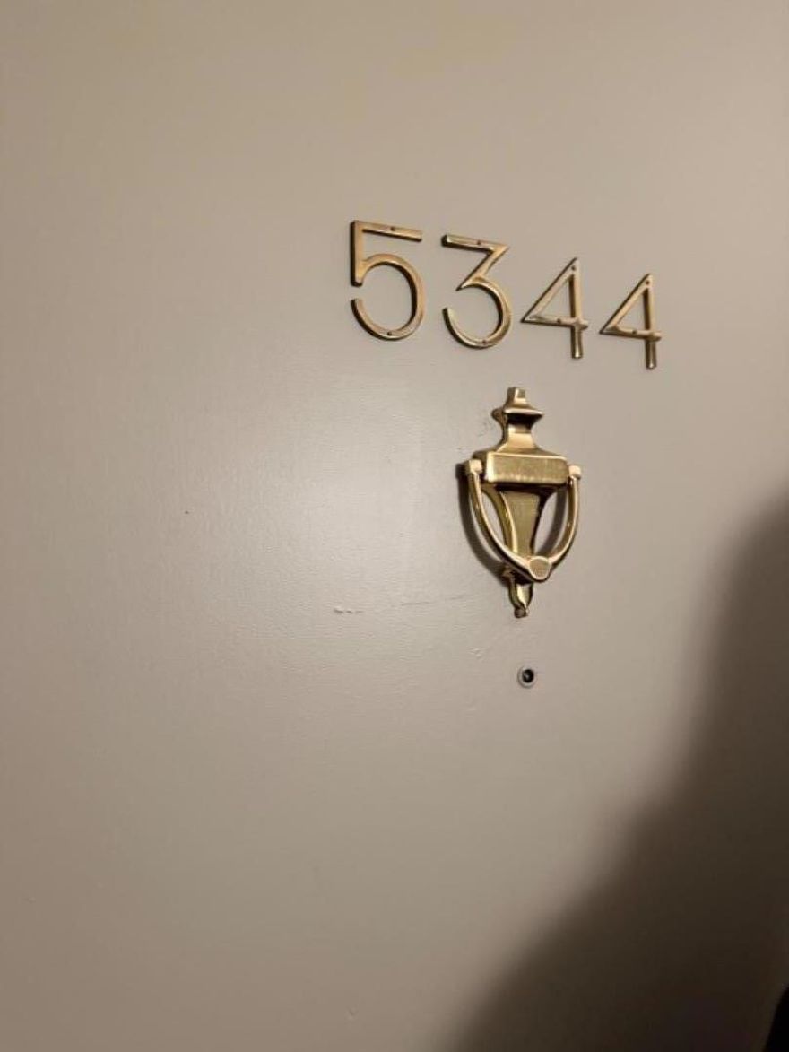 The open-concept living area is bright and inviting, featuring a large sliding glass door that leads to a private balcony. From here, you can enjoy a beautiful green vista filled with trees, walking paths, and the peaceful sights and sounds of nature  an ideal spot for morning coffee or evening relaxation.  The kitchen flows seamlessly into the living and dining spaces, creating a welcoming environment for entertaining or everyday living. Both bedrooms are generously sized, with the primary suite offering an en-suite bathroom and ample closet space. The second bedroom and bath provide flexibility for guests, a home office, or additional living space.