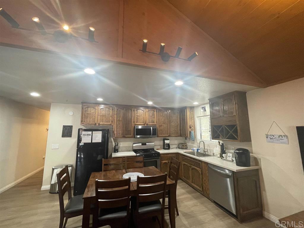 This home located in a beautiful area, have 4 bedrooms and 3 baths. Combine living room & family room for entertainment with updated wood flooring. Master bedroom has a portable A/C also with Jacuzzi/spa in master bathroom. The entire house fenced for privacy from the garage up to the entrance and in the corner lot. Has abundances of plants trees and fruits in the backyard for owner to enjoy in the summer.