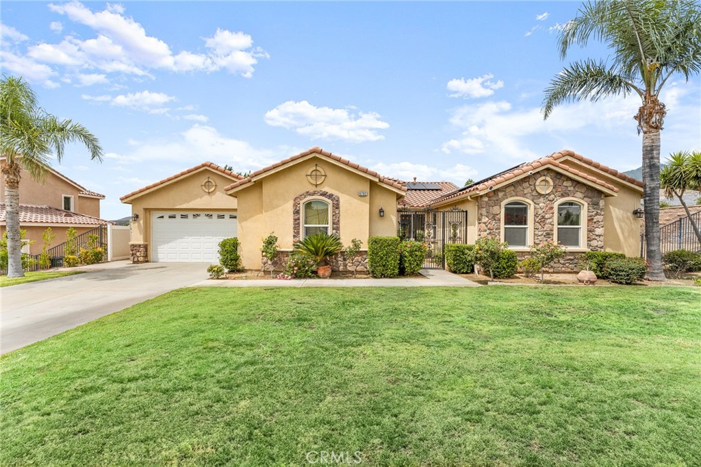 Discover the elegance of prestigious Verdemont Estates with this beautiful single-story, pool home on a corner lot that offers an exceptional blend of comfort and style. Featuring 5 bedrooms and 4.5 bathrooms, this residence is designed for modern living. The expansive kitchen, complete with a cozy breakfast nook, flows seamlessly into a separate formal dining room—perfect for entertaining. The kitchen opens up the large family room with a fireplace and there is a separate formal living room. Also, a powder room is next to the indoor laundry room which includes cabinets and a sink! There are many custom design features that you will notice once inside! Including a workstation area in the hallway! A perfect floor-plan!
Retreat to the primary suite, where you'll find a spacious bathroom and a generous walk-in closet. On the opposite side of the home, three additional bedrooms await, including one with an en-suite bath and a convenient Jack and Jill bath for shared use.
Enhancing its versatility, a private casita (the 5th bedroom and 4th bathroom)provides potential as an ADU, office, workout space, or game room. The home also boasts a lovely courtyard. The backyard is an oasis including and a refreshing pool and spa, covered patio with fans is ideal for outdoor enjoyment. Relax with a cup of coffee or enjoy the mountain views.
Additional highlights include a solar lease for energy savings, this home is located near CSUSB few minutes to the freeway large garage with plenty of storage, freshly painted interiors, and new carpet throughout. This wonderful home is a true gem in Verdemont Estates—don't miss your chance to make it yours!