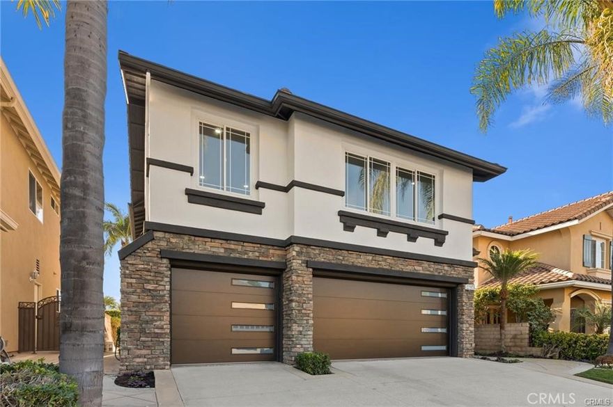 Designer Home in Guard-Gated San Joaquin Hills

Step into serenity and sophistication with this beautifully residence, nestled in the prestigious guard-gated community of San Joaquin Hills. Offering approximately 3,284 sq ft of open concept living, this home blends luxury and functionality in every detail. Interior Highlights: Grand entry with soaring ceilings and a dazzling crystal chandelier. Formal living and dining rooms ideal for entertaining. Elegant office on the main floor, convertible to a 5th bedroom. Chef’s kitchen with high-end Frigidaire appliances. New flooring and upgraded bathroom vanities throughout. 4 spacious bedrooms and 4 full bathrooms. Dual master suites with quartz countertops and walk-in closets. Primary suite features a private balcony with mountain views, oversized bath, makeup vanity, and his & hers closets. Secondary master offers a tranquil retreat for guests. Guard-gated privacy and community amenities. A rare blend of elegance, comfort, and modern living. Available Now! Schedule your private tour and experience the elevated lifestyle this home offers.
