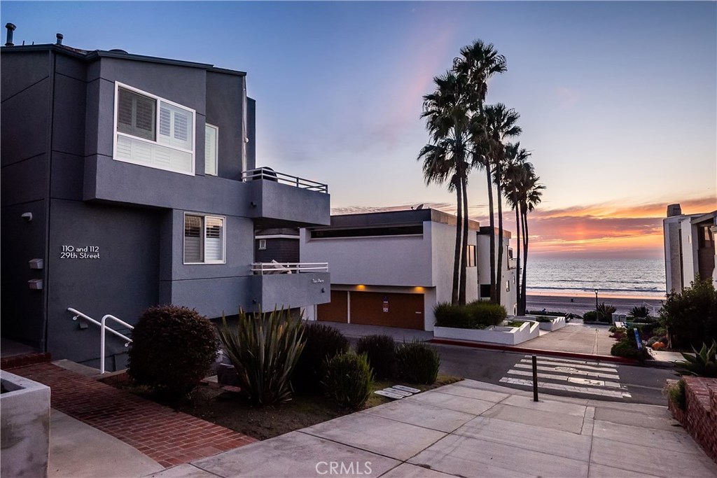 Location! Location! Location! It's Summer Year Round in this PANORAMIC OCEAN VIEW, fully furnished, 3 bd, 3 bth walk street home. Perfectly pirched on the corner of Ocean Dr, and 29th St, this amazing beach property is STRAND ADJACENT and merely steps to the sand. Ideally located, you are just a short stroll to downtown Manhattan Beach and North Manhattan Beach shops and restaurants. This home is Light, Bright and Drenched in Sunlight. Features include Custom made kitchen cabinets, Banquette with custom made dining table of reclaimed wood, Wood floors, Fireplace, Washer/Dryer, Furniture from Restoration Hardware and Pottery Barn, Ocean views from all 3 decks, which include PANORAMIC OCEAN VIEWS from Malibu, to Catalina, on the top deck. If this weren't enough, you even have 3 car garage. Hurry, this will not last!