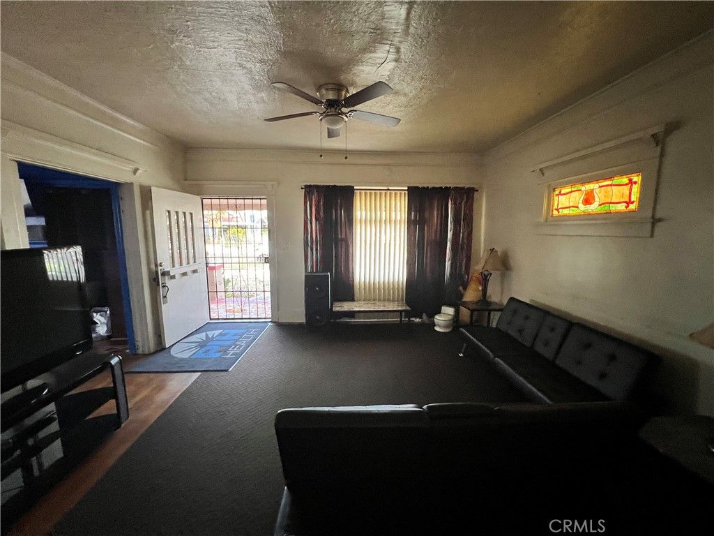 Photo of 1826 W 46th St St, Los Angeles, CA 90062 (MLS # DW26037729)