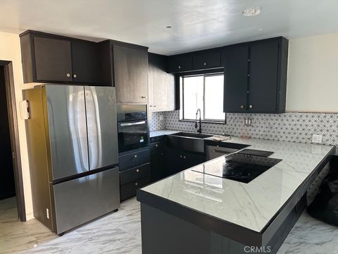 Photo of 7428 Acoma Trail Trl #2, Yucca Valley, CA 92284 (MLS # OC25282308)