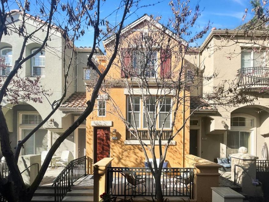 Nestled within Rivermark, this Park Plan 2 townhome boasts a highly sought-after floorplan with a main-level bedroom and full bath, ideal for guests or extended family. The open-concept design offers brand-new flooring, modern recessed lighting, and oversized windows that create a bright and airy atmosphere. A stylish, updated kitchen features brand new quartz countertops, stainless steel appliances, freshly painted white cabinetry, and a full pantry wall for extra storage. Upstairs, two luxurious suites include walk-in closets and private en-suite baths, with a laundry area conveniently nearby. Just moments from Rivermark Plaza, parks, Don Callejon schools, and major tech campuses,a short walk to Google bus stop and Guadeloupe trail and parks,  this home offers the perfect blend of comfort and accessibility. Experience the best of Silicon Valley living in this move-in-ready gem!