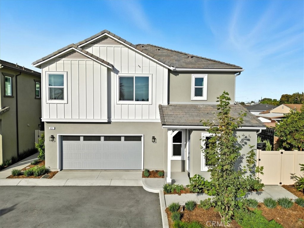 Highly upgraded former model new construction home in Carson! This open-concept 4-bedroom, 3-bathroom residence exudes sophistication with exquisite designer finishes throughout. A main-level bedroom with a full bath offers convenience, while upstairs features additional bedrooms and a spacious laundry area. The chef’s kitchen is a showstopper, equipped with premium Wolf appliances, a generous center island, and abundant counter and storage space—perfect for culinary creations and hosting gracious family dinner parties. Its seamless flow into the dining and living areas makes entertaining effortless, allowing family and guests to mingle while meals are prepared. Step outside to a beautifully landscaped backyard, ideal for relaxation and enjoying the California sunshine. The primary suite is a serene retreat, featuring a spa-like walk-in shower and a luxurious, private ambiance. Residents also benefit from community amenities, including a lounging area with outdoor BBQ, fireplace, dog area, and play area. Located close to the 110 and 405 freeways, this luxurious new construction home combines sophisticated design with modern convenience. Don’t miss out on the opportunity to make it yours! INTERIOR PICTURES HAVE BEEN VIRTUALLY STAGED