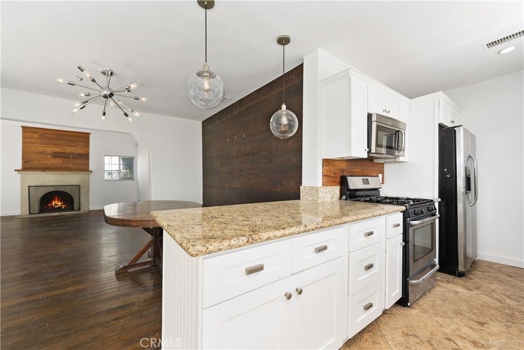 Photo of 1944 Chariton Street, Los Angeles, CA 90034 (MLS # SR25113018)