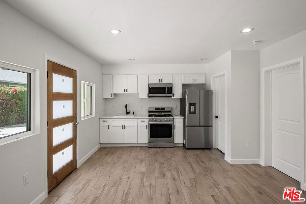 This pristine remodeled 1 bed/1bath unit is in the heart of it all! Steps from Eagle Rock Boulevard and Colorado Blvd, you'll find yourself minutes from anything you need, while still coming home to tranquility off Eagle Rock's "main drag." In addition to brand new appliances, paint, floor, a remodeled bathroom, and excellent finishes, this unit is equipped with a split system heating and air conditioner. Sliding doors lead to a private outdoor area and you are a short trip to everything this sought after neighborhood has to offer. This unit combines historic charm with the convenience of urban living. Located in the heart of downtown Eagle Rock, walking distance to all of the hot spots along Colorado & Eagle Rock Boulevards. Conveniently located minutes to Occidental College.