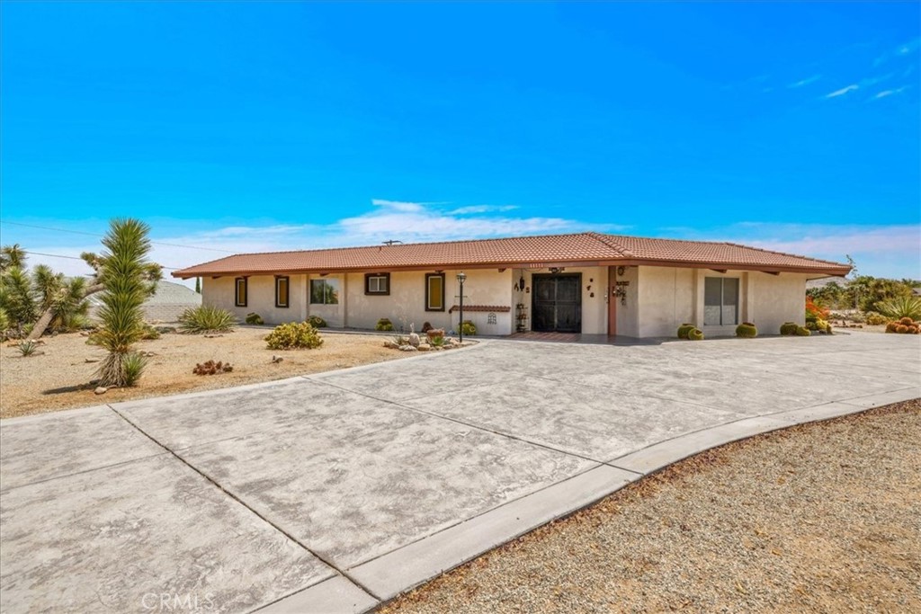 VERY MOTIVATED SELLER! Mid-Century Post and Beam Architectural Gem !Step into timeless elegance with this stunning Mid-Century style home, showcasing classic post and beam architecture that blends clean lines with open space and natural light. Designed with form and function in perfect harmony, this residence features exposed beams, vaulted ceilings, and expansive windows that frame breathtaking views and invite the outdoors in. This gorgeous 3-bedroom, 3-bath,a nice size bonus room home offers plenty of space and stunning features to make your own. Spacious Living - enjoy a thoughtfully designed layout with three generously sized bedrooms, including a luxurious primary suite, a second master bedroom, living room, dining room. Both master bedrooms have two closets each, and private entrance. The kitchen was fully remodeled and features two pantries as well as a freezer. Bar room to entertain is a nice bonus to the property. Relax and unwind in your very own backyard paradise, featuring a sparkling pool with plenty of room for lounging and outdoor entertainment, your Private Oasis .This home comes with a detached spacious workshop for all your projects , can be used for extra parking !and is call for all hobbyists and DIY enthusiasts Convenient detached double car garage to keep your vehicles and equipment secure and protected. Situated in a quiet, desirable neighborhood with breathtaking views, this home is the perfect place to live and entertain. Don't miss out on this fantastic opportunity!