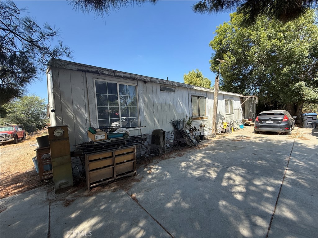 Priced to Sell! 4 Bed, 2 Bath Manufactured Home on 2.4 Acres – Endless Potential!
Don’t miss this rare opportunity to own a 4-bedroom, 2-bath manufactured home on a permanent foundation, sitting on a generous 2.4 acres of usable land in an agricultural zone just off the freeway. This property offers the perfect blend of rural living with easy access to major roads — ideal for those looking for space, privacy, and investment potential.
The home features a spacious layout with 4 bedrooms and 2 full bathrooms, ready for your personal touch. While it needs some cosmetic repairs, it's a solid foundation to build your dream home or income-generating property.
With two separate driveways and a layout that can be divided, the possibilities are endless — create a multi-generational family compound, start a small farm, add a second home, or even rent space to trailers for extra income. There’s plenty of open land to develop as you see fit.
This property is being sold as-is and is priced to sell quickly — there’s no other home on the market at this price with this much land and potential. Whether you're an investor, homeowner, or someone looking to build a rural retreat, this is your chance to make it happen.
Opportunities like this don't last. Act fast!