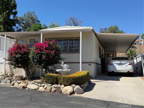 Photo of 35080 Chandler Avenue #43, Calimesa, CA 92320 (MLS # IG26194380)