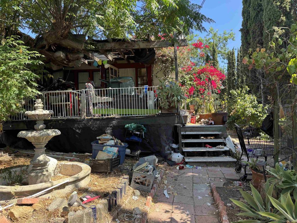 FIXER ALERT!! Investors and developers, get your building plans ready for a rare chance to reimagine a property rich in character. Perfectly positioned at the base of Mt. Helix, this value-add opportunity offers quick access to the shops and amenities of La Mesa and Casa de Oro, with an easy commute to Downtown San Diego. When in its prime, this charming homestead boasted many fruit trees, an aviary, garden beds, lap pool, lanai and 2 outbuildings (art studio and shop) in addition to the cozy, rustic dwelling. This home has been in the family for decades and belonged to the first philosophy and religious studies professor at Grossmont College. This property is offered "as-is", and requires significant rehabilitation. Lot size is 11,958 sq ft and Zoned R-1. Tear down and re-design, or do a heavy renovation. Property is on septic. Only a CASH SALE will be accepted due to the current condition.