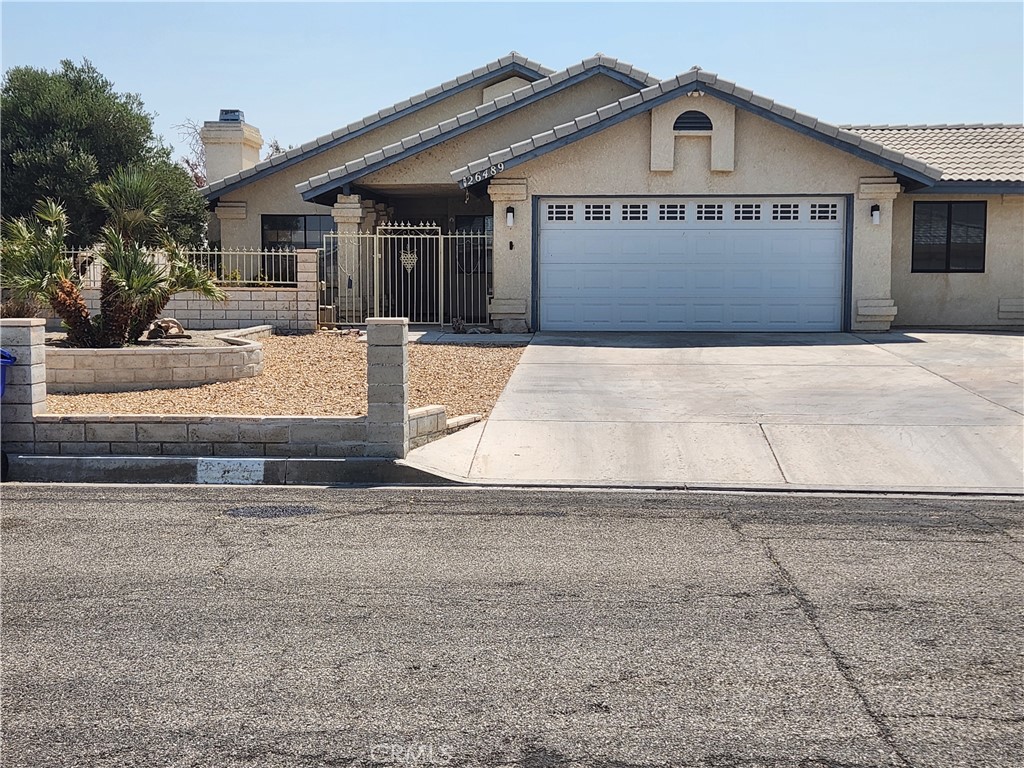A well kept 3 bed / 2 bath home. Approximately 1481 square feet of living space with an attached bonus room off the garage with its own separate entry. If you are looking for quiet living, this is your new home! A residential vacation everyday! This beautiful home has new carpet and fresh paint in the main living areas. Complete kitchen with breakfast nook, stainless steel drop in sink, WIFI enabled stove and dishwasher, plus a stainless steel refrigerator with tons of storage space. Indoor laundry. Tile roof built to last for years. Main bedroom is spacious with an ensuite equipped with double vanity, large jetted tub, and water closet. Ducted for both HVAC and evaporative cooler, plus a fully operational irrigation system. Gorgeous landscaping in the front with a tranquil landscaped backyard with a waterfall. Plus a large permanently grounded shed. Front and rear covered patios. The outdoor balcony provides breathtaking views of the mountains and a great spot to view the July 4th fireworks. Living room has a nice fireplace. You must see it to appreciate it! Sellers are motivated and under contract.