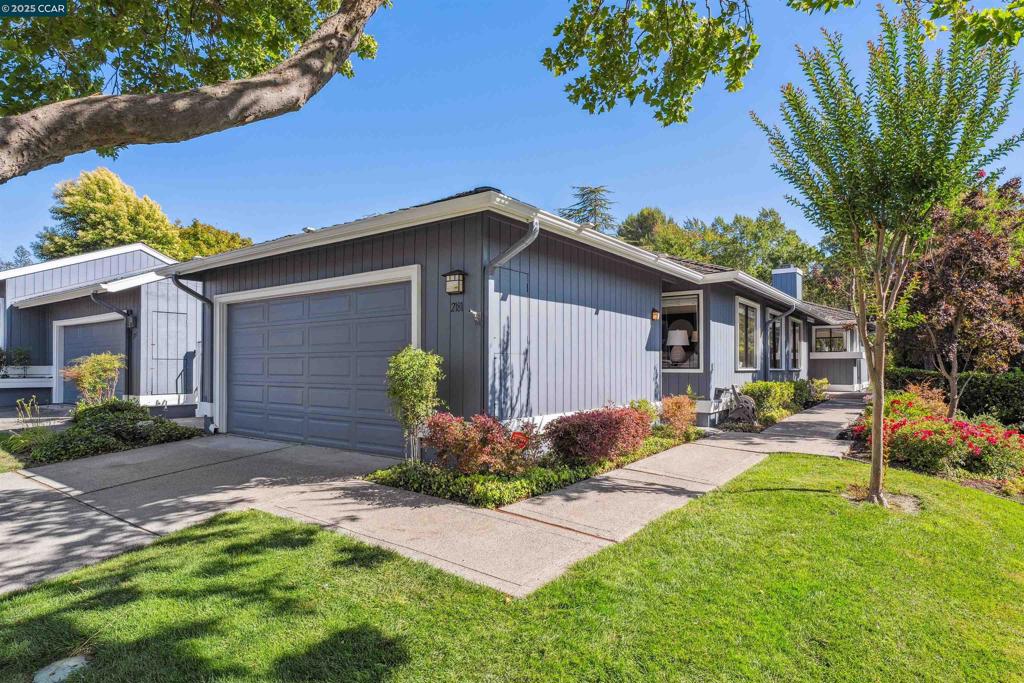 Located in the heart of the prestigious Crow Canyon Country Club, this beautifully updated end-unit home offers the perfect blend of modern elegance, everyday comfort, & resort-style living. The home features a freshly painted exterior, newly refinished kitchen cabinets, designer lighting throughout, and brand-new flooring - all thoughtfully curated to elevate its stylish and welcoming atmosphere. As an end-unit, it enjoys added privacy and tranquility, and is filled with abundant natural light throughout. Lovingly cared for, this home has been meticulously maintained. Inside, you’ll find 3 generously sized bedrooms, 2 full bathrooms, and 1,553 square feet of thoughtfully designed living space. A sun-filled atrium anchors the layout, bringing in natural light and creating an airy ambiance that connects beautifully to the outdoors. The living room feels bright and expansive, centered around a sleek modern fireplace and large windows that flood the space with sunlight - the perfect setting for both quiet relaxation and lively gatherings. A spacious kitchen and cozy dining nook flow into a large family room, making daily living and entertaining effortless. Step outside to the serene back patio, where sweeping views of the golf course, rolling hills, and wide-open skies await.